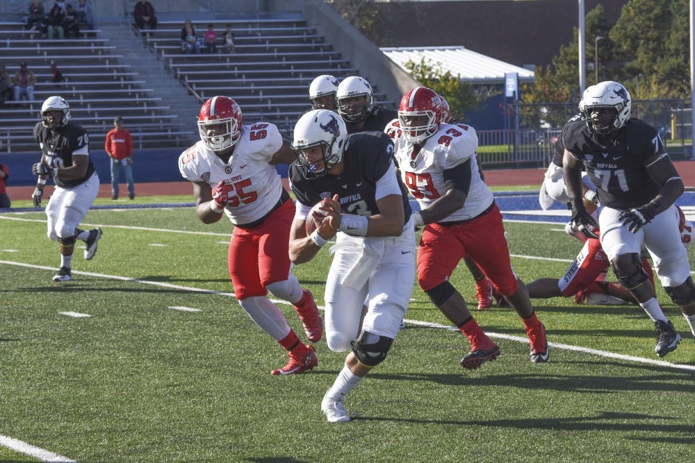 <p>Freshman quarterback Tyree Jackson rushes against Ball State.&nbsp;Jackson threw four interceptions in Saturday's game against Northern Illinois.&nbsp;</p>