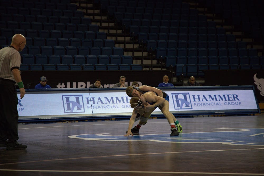Graduate student Derek Spann (pictured here in February 2020) earned a 17-2 technical fall in the 133 lb. bout Saturday.