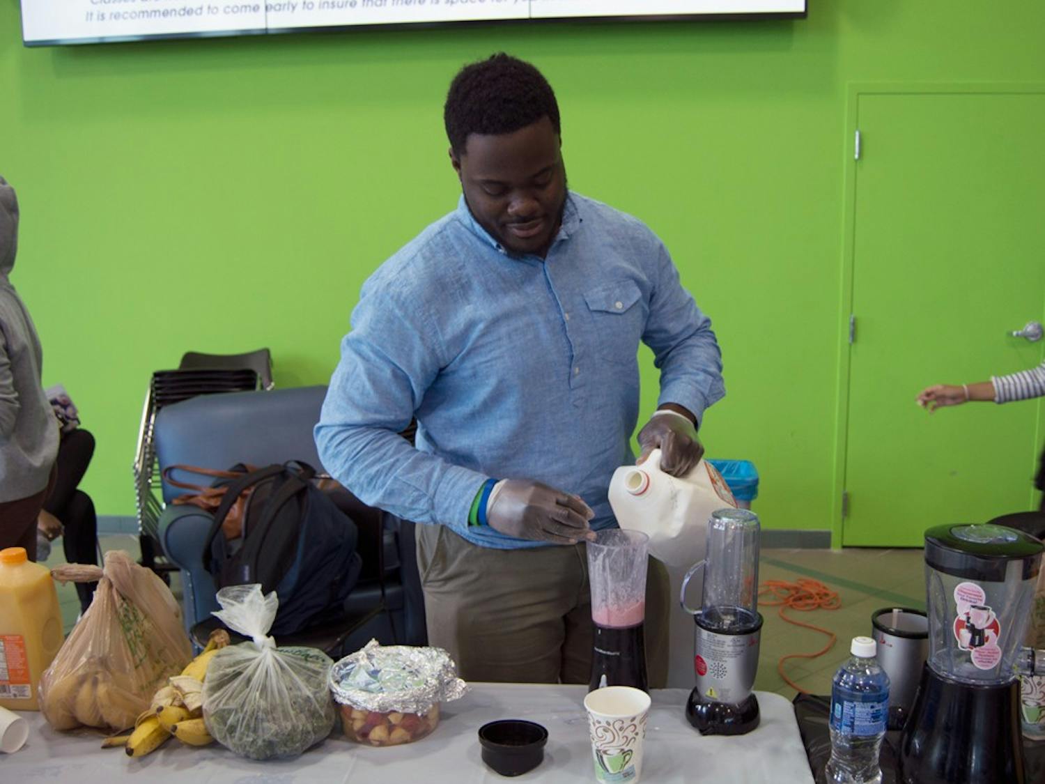 Caribbean Student Association Vice President Shawn Gibson makes a smoothie, which is one event the CSA offered this week in the Student Union. All of the events were intended to encourage students to learn more about Caribbean culture.