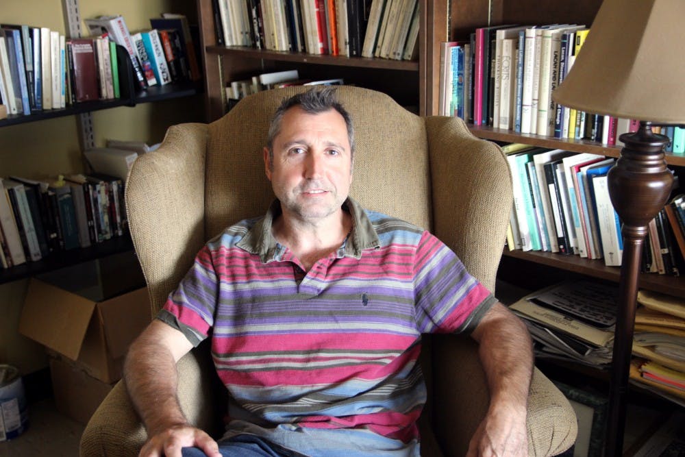 <p>David Castillo, director of the Humanities Institute, sits in his office. Castillo discussed the agenda for this year’s Buffalo Humanities Festival.</p>