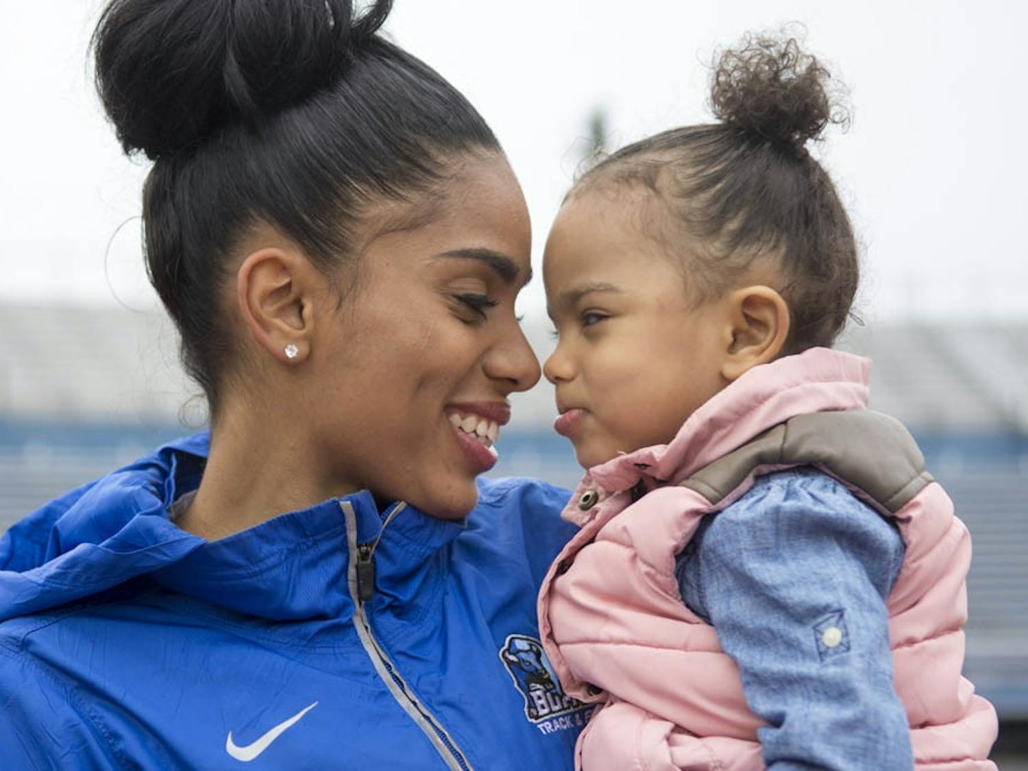 Asher Beasley, a hurdler on the women's track and field team, gave birth to her daughter Jace on May 9, 2014. Since then, she has come back to UB even stronger.