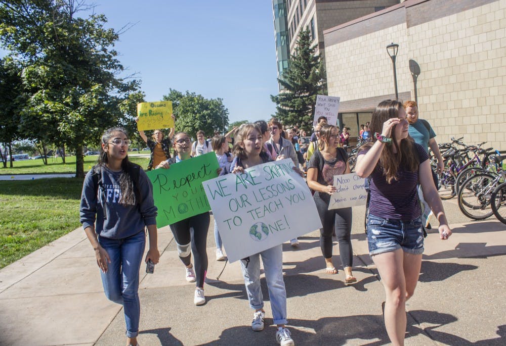 UB students protesting the fossil fuel industry Friday.