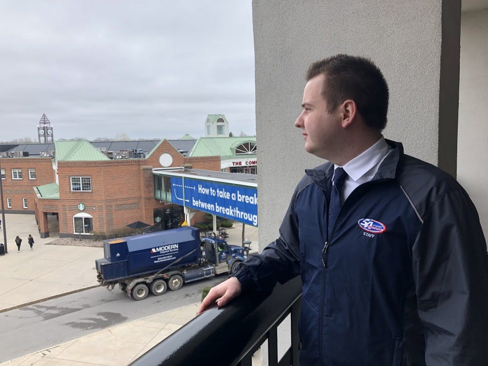 <p>&nbsp;UB Student Association President Gunnar Haberl looks out at campus from the Student Union balcony. Haberl reflected on his year as SA president and discussed his plans for the future in an interview with <em>The Spectrum</em>. &nbsp;</p>