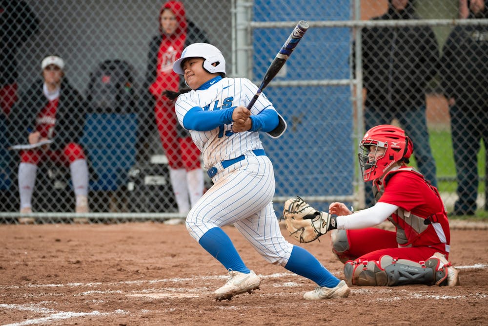 <p>Graduate student utility player Anna Aguon connects with a pitch during a recent game against Miami (OH).</p>