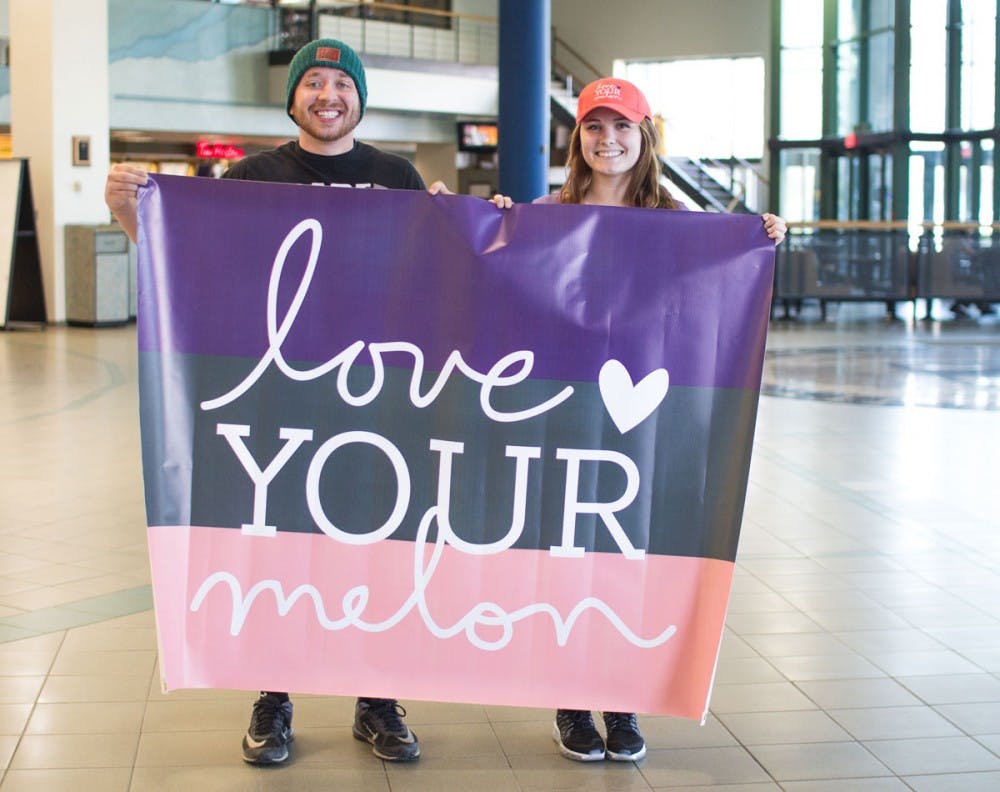 <p>Kim Charleson (right) and Matt Kondziela (left) are two UB students and members of UB Love Your Melon. Love Your Melon is a nonprofit organization that donates beanies to children cancer patients across the country.</p>