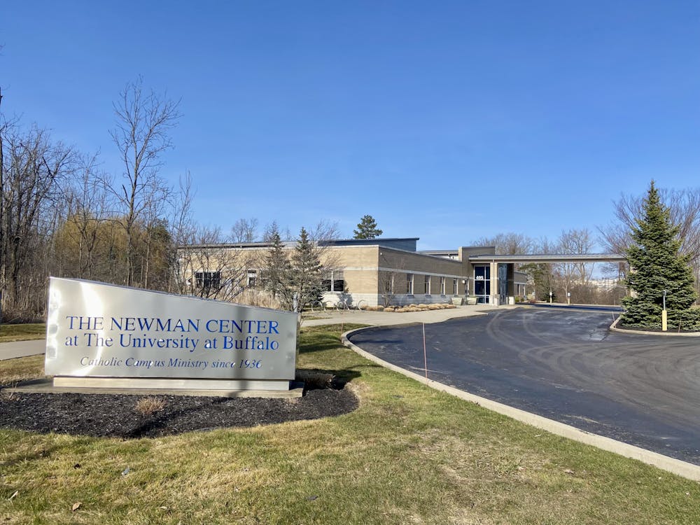 <p>The Newman Center Catholic Ministry on Skinnersville Road, near UB's Creekside Village apartment complex. The Newman Center is one of 22 properties earmarked for potential sale by the Roman Catholic Diocese of Buffalo to help settle nearly $100 million in child sex abuse claims.</p>