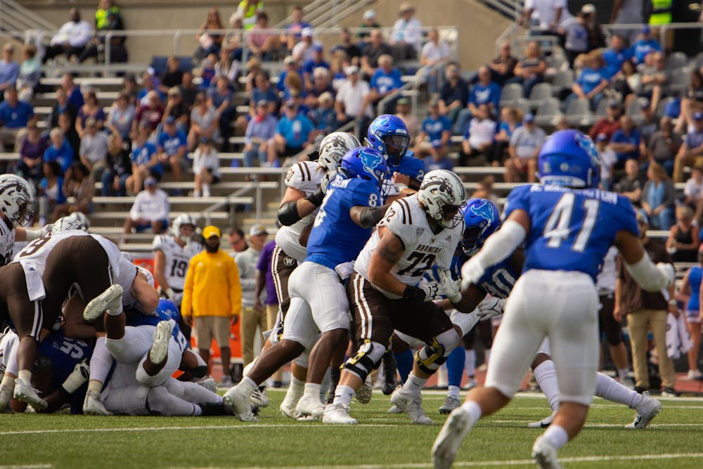 Cornerback Aapri Washington (41) looks on as linebacker James Patterson (8) makes a tackle during UB's 24-17 loss to Western Michigan in early October.