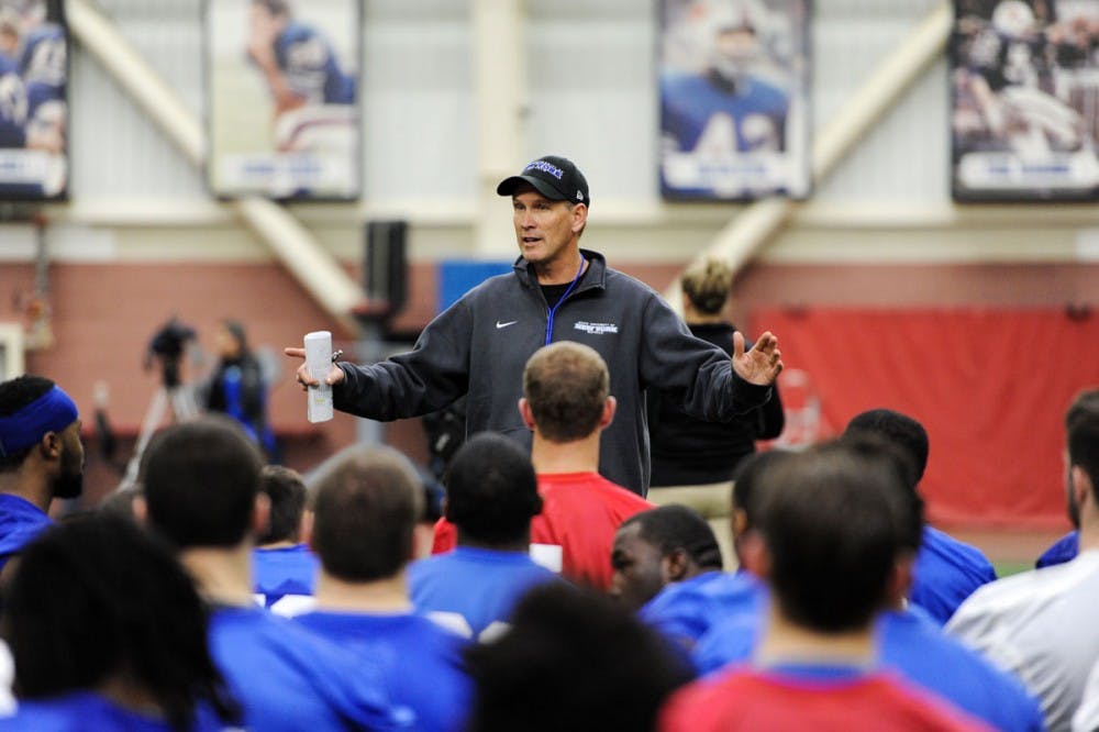 <p>Head coach Lance Leipold addresses the football team after his first practice as Bulls head coach in the ADPRO Sports Training Center. Leipold enters his first season in Buffalo after winning six national championships at the Division III level. </p>