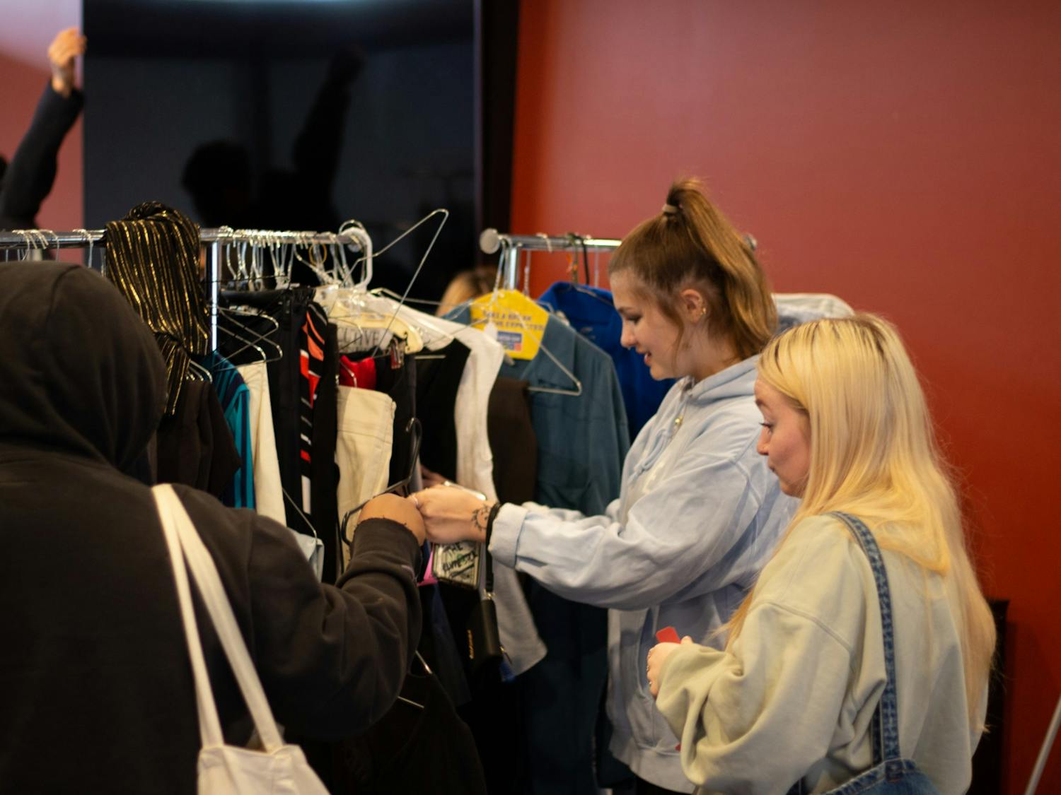 Students look through clothes at a recent UB Hired event.&nbsp;