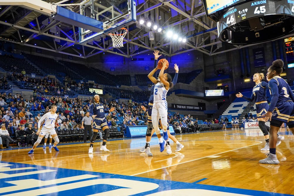 <p>Freshman Guard Dyaisha Fair goes in for a shot during the game against the Akron, Zips Wednesday night in the Alumni Arena.</p>