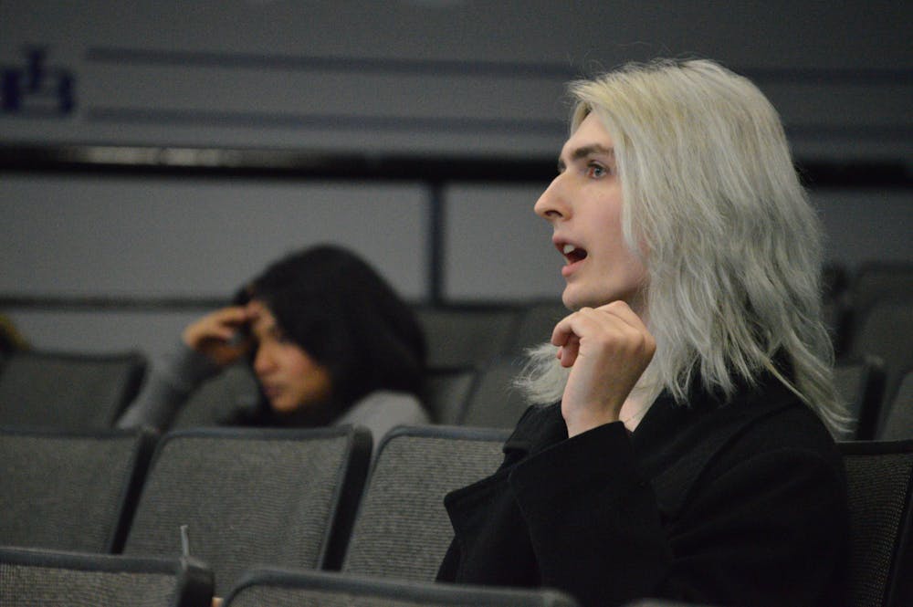 LGBTA junior e-board member Lorien Samarra speaks in favor of the resolution during Wednesday's SA Senate meeting.