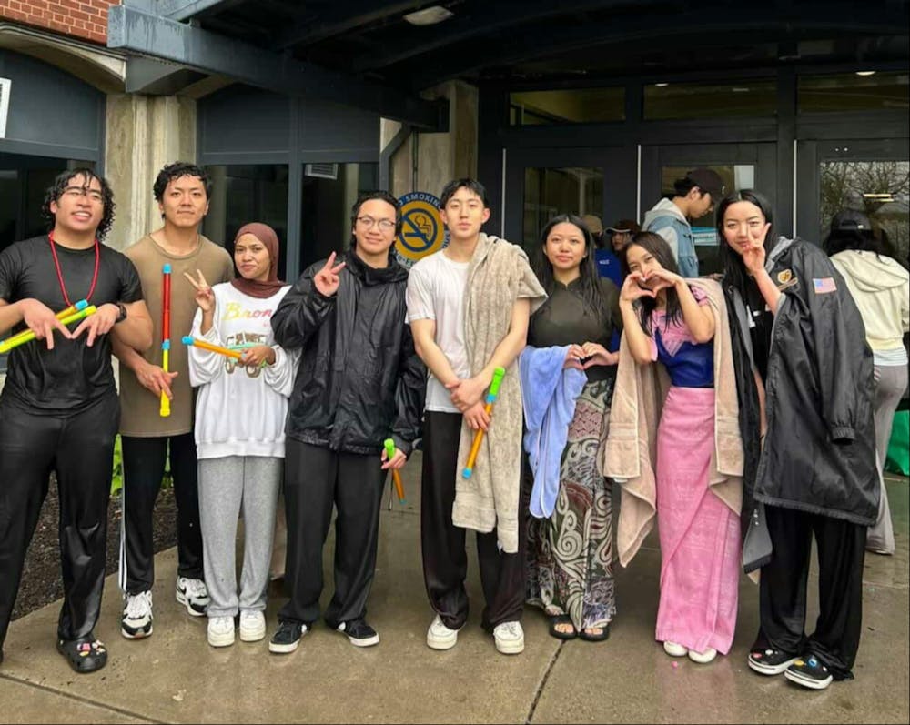 The Myanmar Student Association outside of Goodyear Hall.