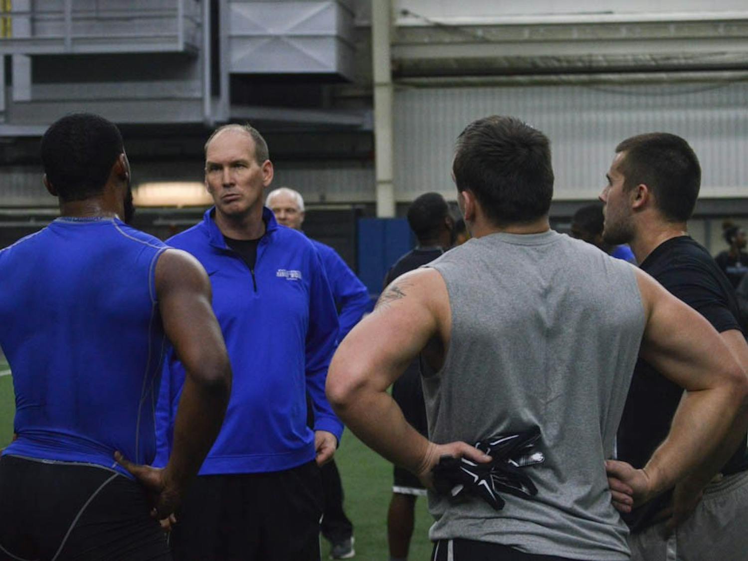 Head coach Lance Leipold coaches up some of his players at UB's Pro Day on March 10.&nbsp;