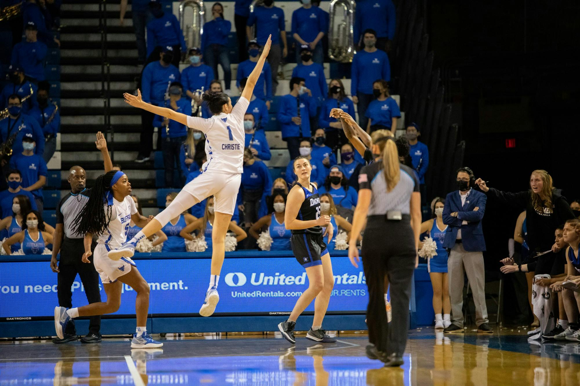 Junior forward Loren Christie (1) jumps to block a shot in the Nov. 4 exhibition game against Daemon College. The Bulls will travel to Paradise Islands, Bahamas for the  Bad Boy Mowers Battle 4 Atlantis Tournament Saturday.