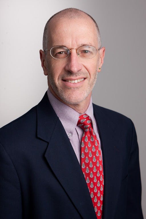 E. Bruce Pitman will resign as dean of the College of Arts and Sciences at the end of the academic year. 