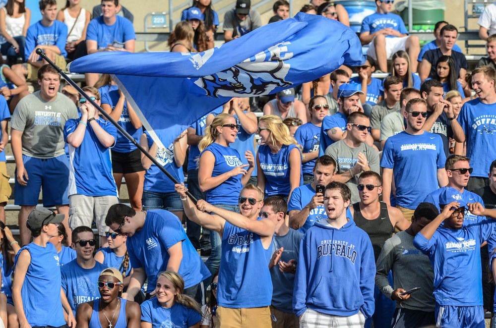 <p>Multiple UB students are cheering on Buffalo with a “True Blue” flag being waved from Saturday’s football game. Only an estimated 2,000 students were present at this game, compared to 5,000 from the opener against Albany.</p>