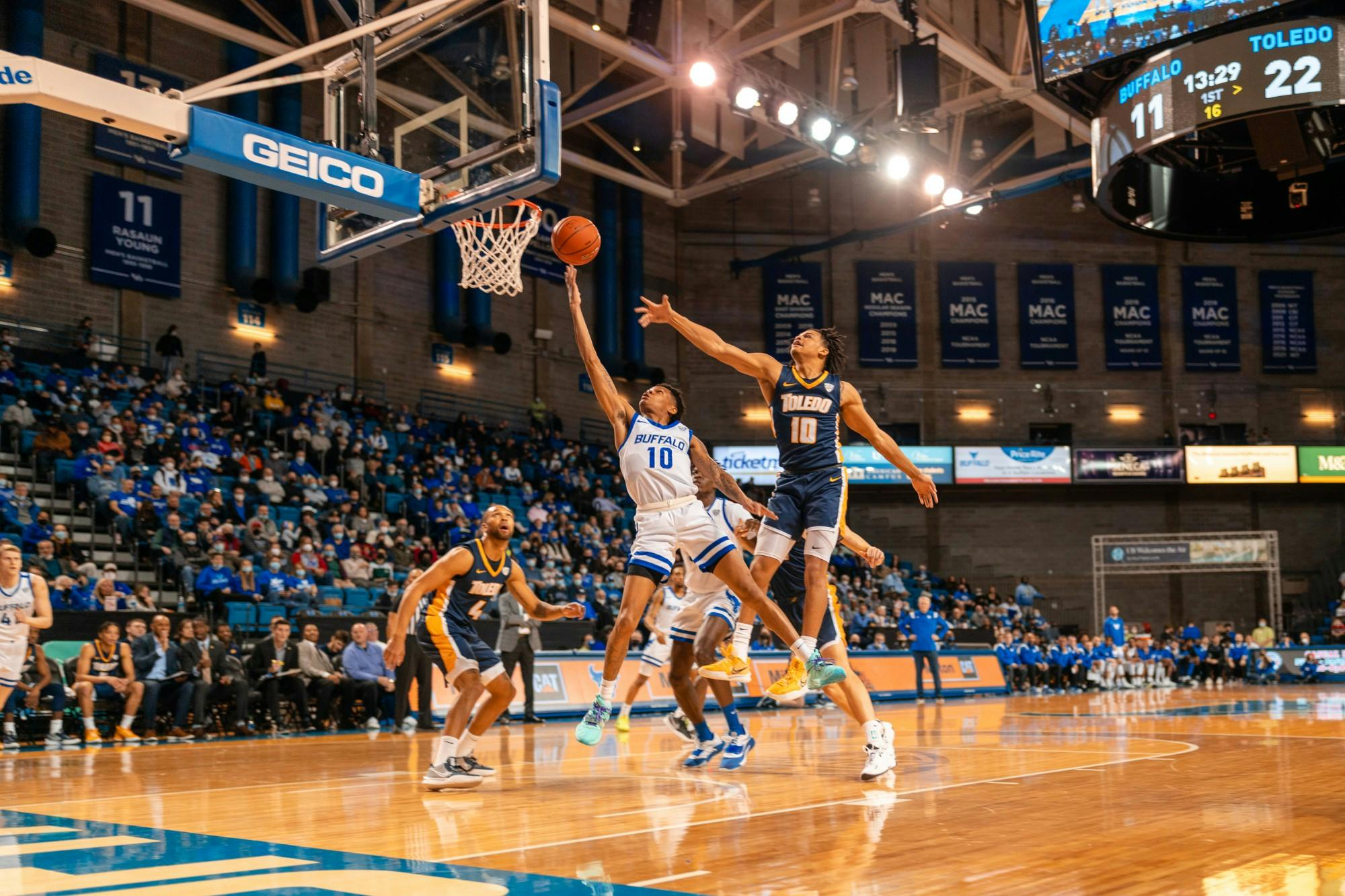 Senior forward Ronaldo Segu (10) reaches for the ball in a recent game against Akron.