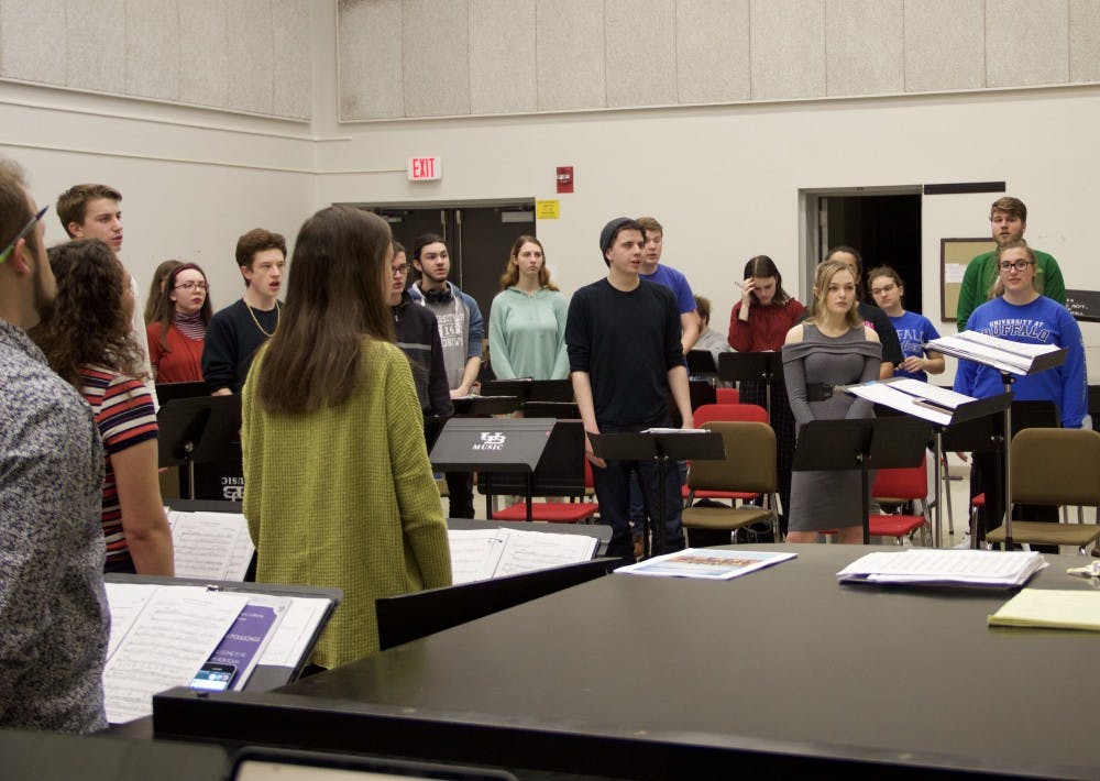 The UB Choir practices for “Love Songs from the British Isles.” 