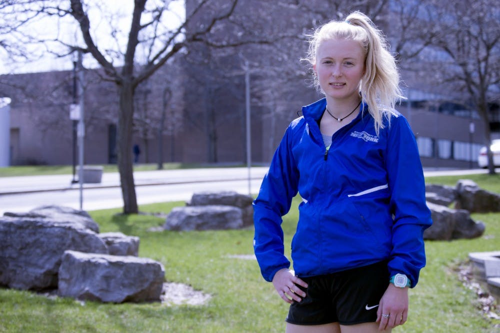 <p>Senior long distance runner Amy Shaw holds the program record in the indoor and outdoor 5k race.</p>