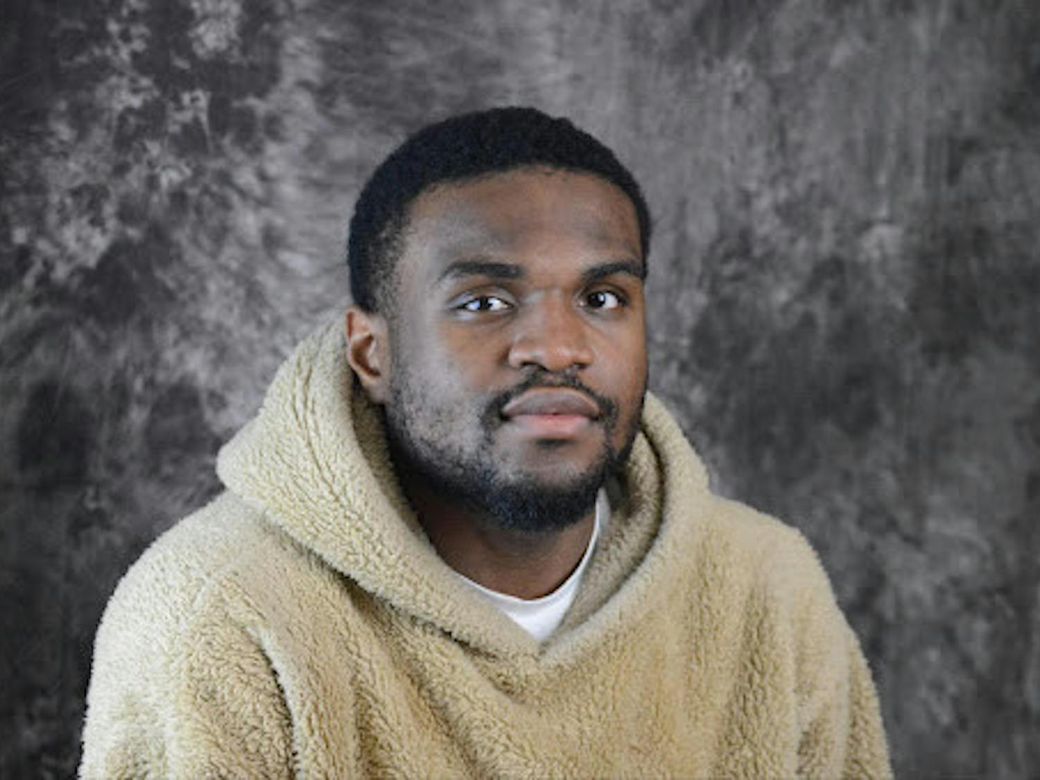 A headshot on Iyonamwan Ogedegbe. 