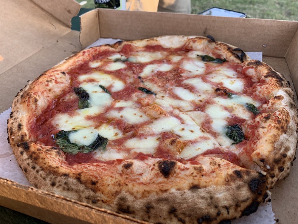 Puffy and fresh, this Margherita pizza is hard to put down.