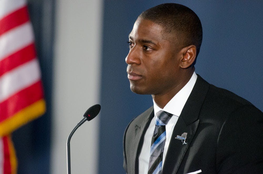 <p>Allen&nbsp;Greene listens during his introductory press conference as athletic director in November of 2015.&nbsp;</p>