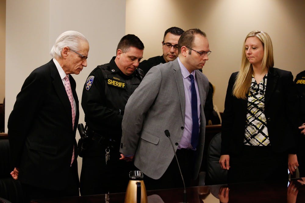<p>Jeffrey Basil is led away in handcuffs on Jan. 21 after a jury announced they’d found him guilty of second degree murder in the death of William Sager. Basil was set to be sentenced on Monday, but the case has been adjourned until April 7 now that his attorney is filing a motion to set aside the verdict.</p>