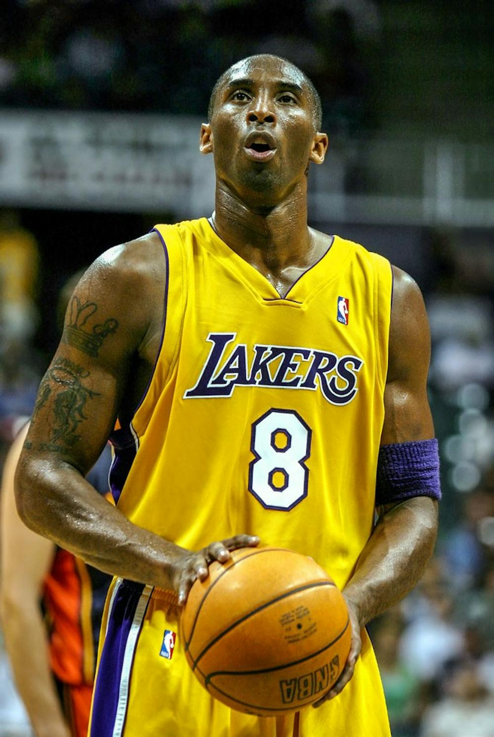 <p>Kobe Bryant looks on as he prepares to take a free throw. Players and coaches on the men's basketball team talked about watching Bryant and his career after Bryant announced his retirement Sunday.</p>