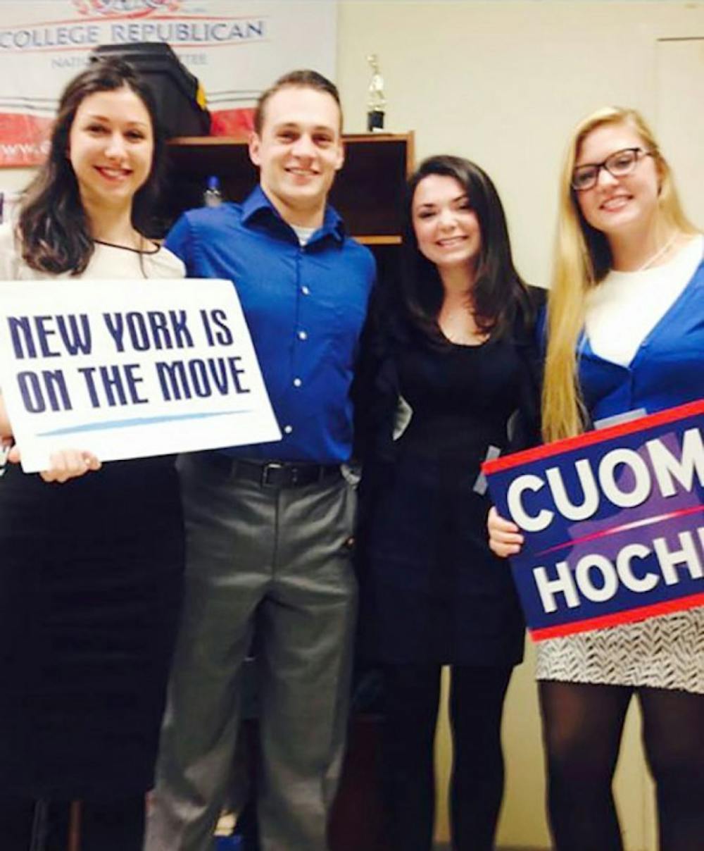 Laura Mannara (far left), president of College Democrats,&nbsp;
went with other members in her club (Sean Kaczmarek, Melissa Kathan,&nbsp;
and Carly Gottorff) to watch the gubernatorial debate watch party for&nbsp;
Gov. Andrew Cuomo.&nbsp;Curtosy of Laura Mannara