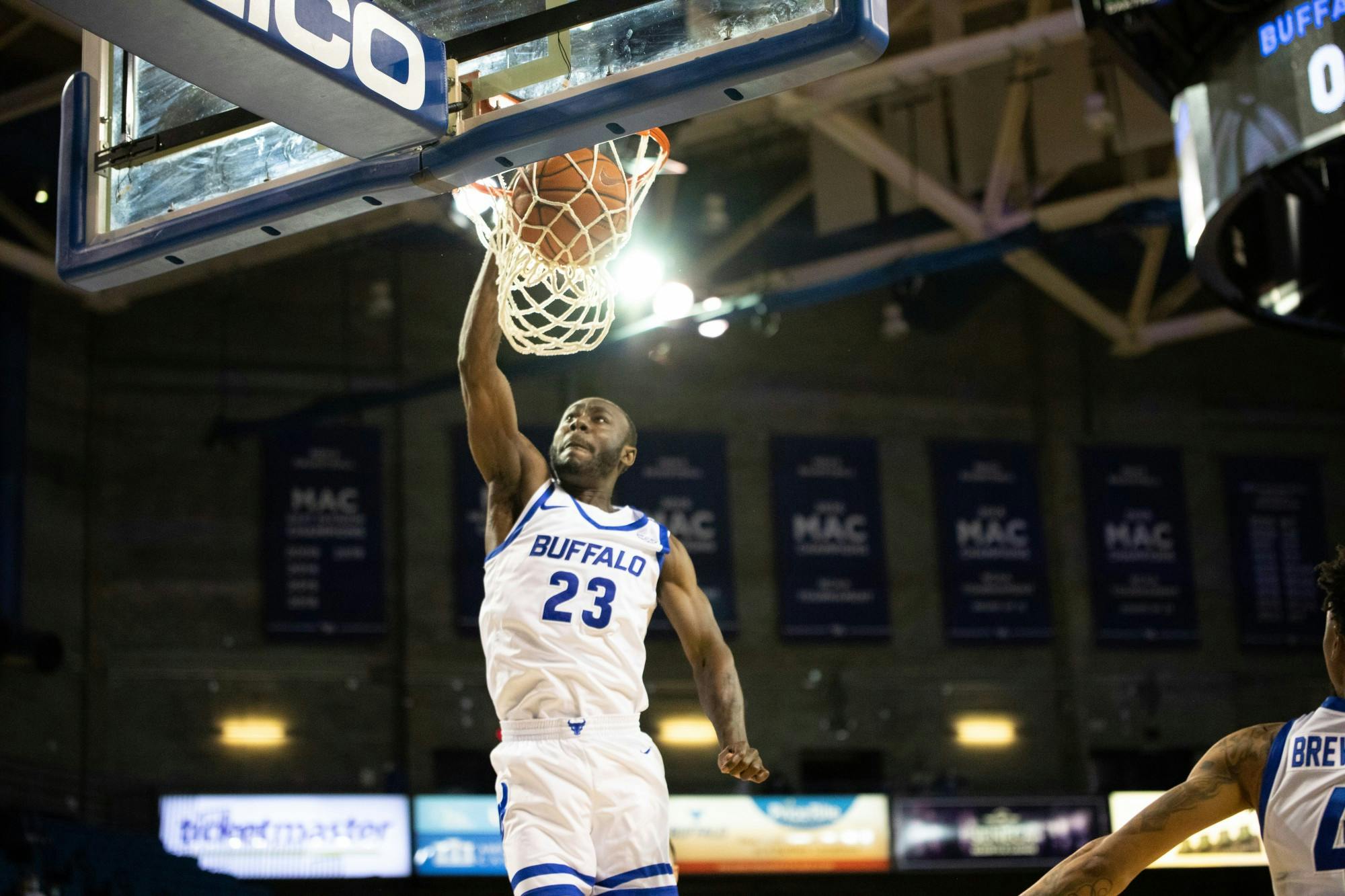 Redshirt senior guard Jamon Bivens dunks before a recent game. The Bulls defeated Rider 87-65 in their home opener Saturday afternoon.