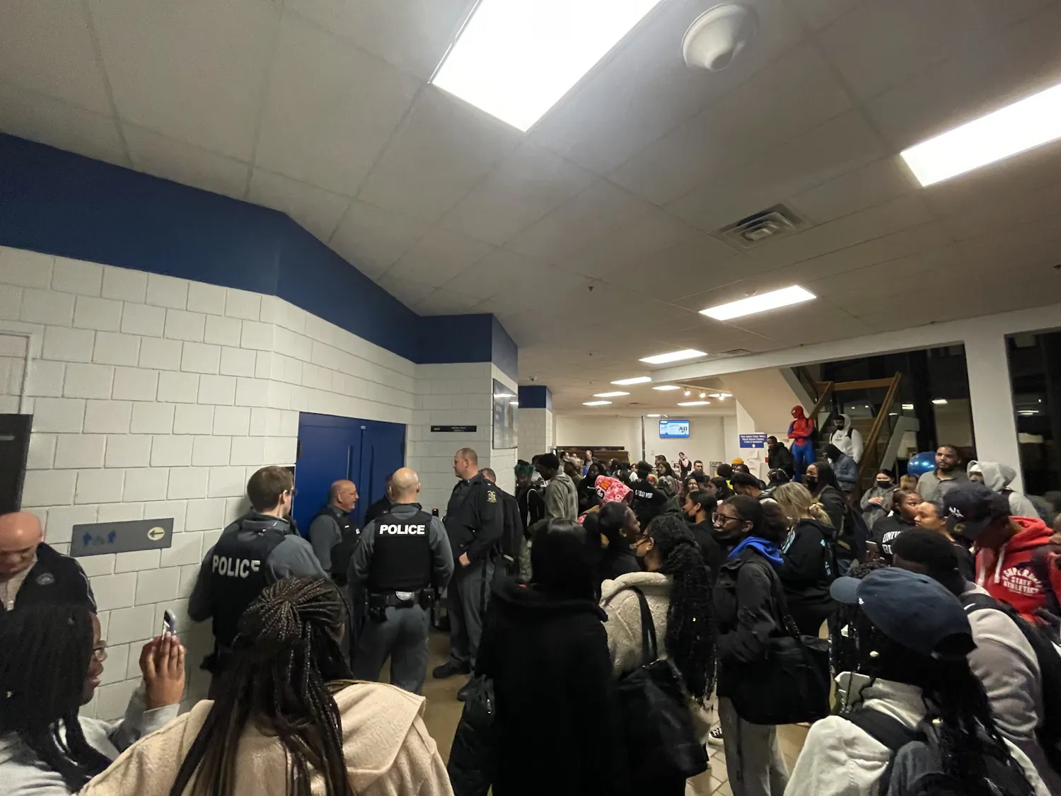 Dozens of students packed the hallways outside Student Union 145 Thursday evening to protest Allen West's speech.