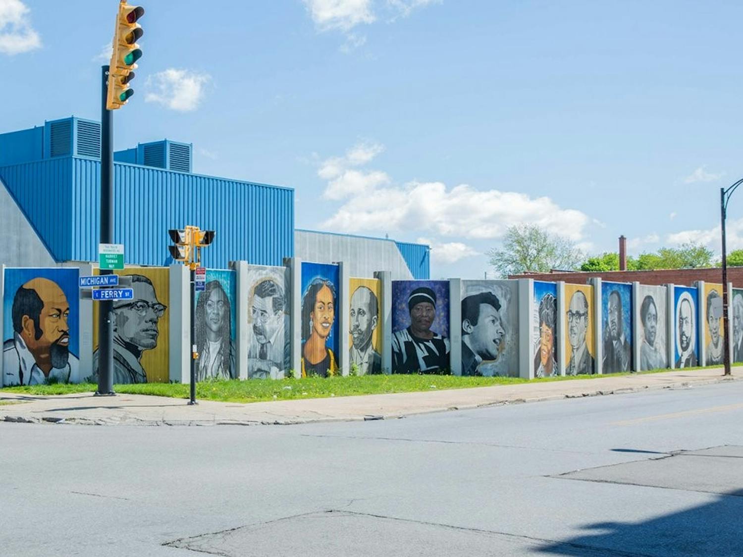 The Freedom Wall, by John Baker, Julia Bottoms, Chuck Tingley and Edreys Wajed, located on the corner of Michigan Avenue and East Ferry Street. 