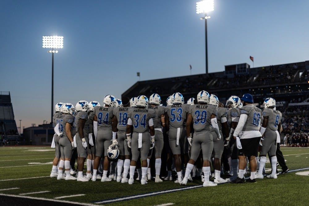 The Bulls huddle up during last week's game against Robert Morris.