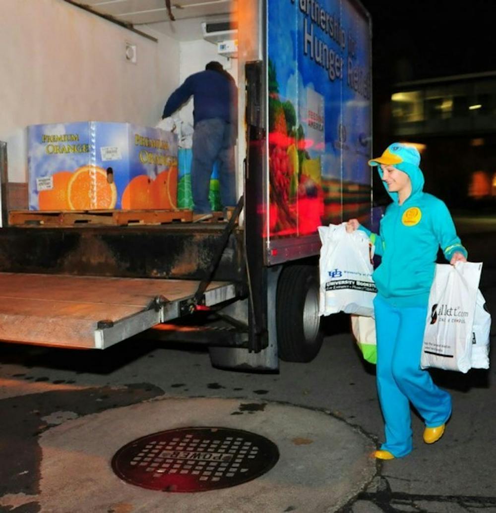 Students who participate in Trick or Eat go door-to-door collect non-perishable food items for food pantries in Western New York. Last year, students collected more than 1,400 pounds of food. &nbsp;Courtesy of Jennifer Jerussi