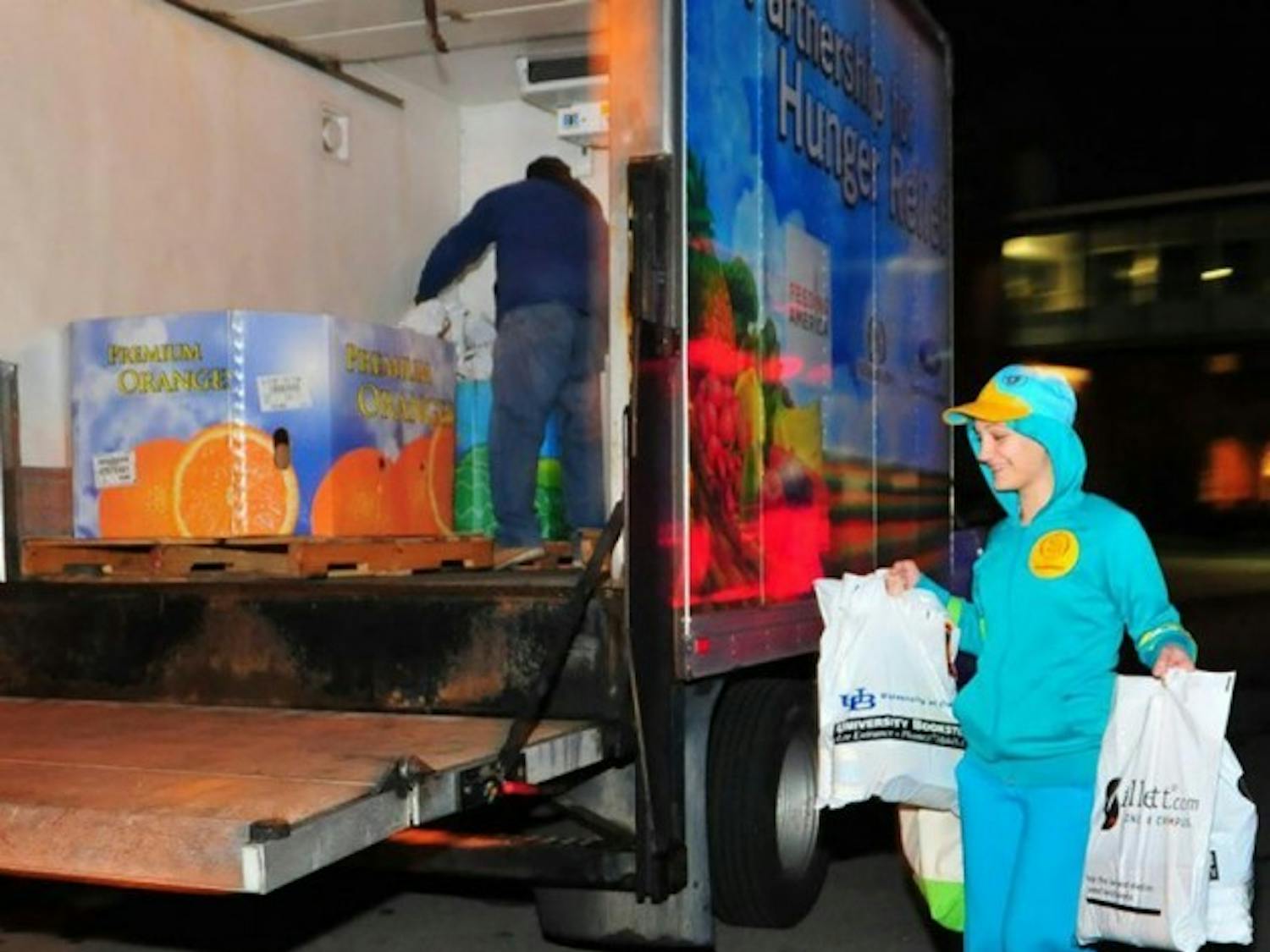 Students who participate in Trick or Eat go door-to-door collect non-perishable food items for food pantries in Western New York. Last year, students collected more than 1,400 pounds of food. &nbsp;Courtesy of Jennifer Jerussi