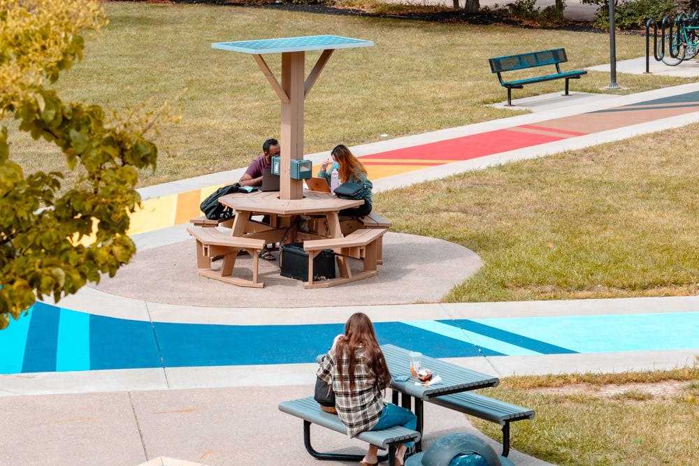 <p>“Progress Pride Paths,” a rainbow-colored sidewalk in Knox Quad and last year’s Contemplative Sites project, celebrates the LGBTQ community.&nbsp;</p>