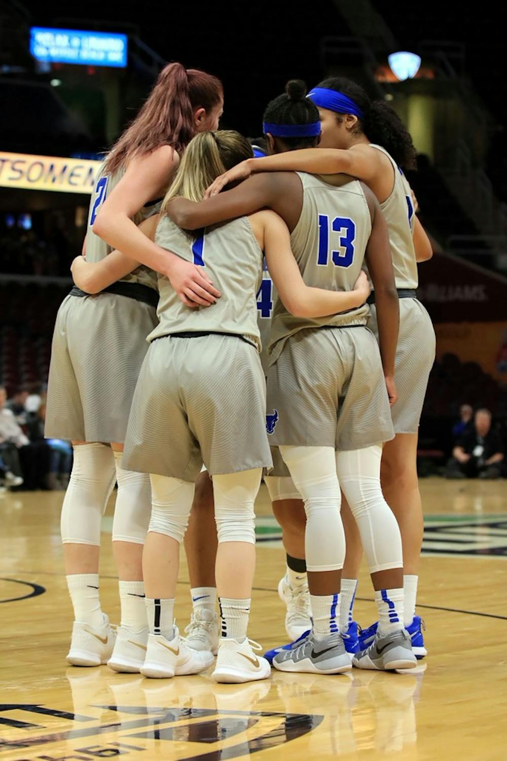 <p>Players from the women’s basketball team huddle in the MAC championship game against the Central Michigan Chippewas. The Bulls lost 96-91 but will now look for an at-large bid for the NCAA tournament.</p>