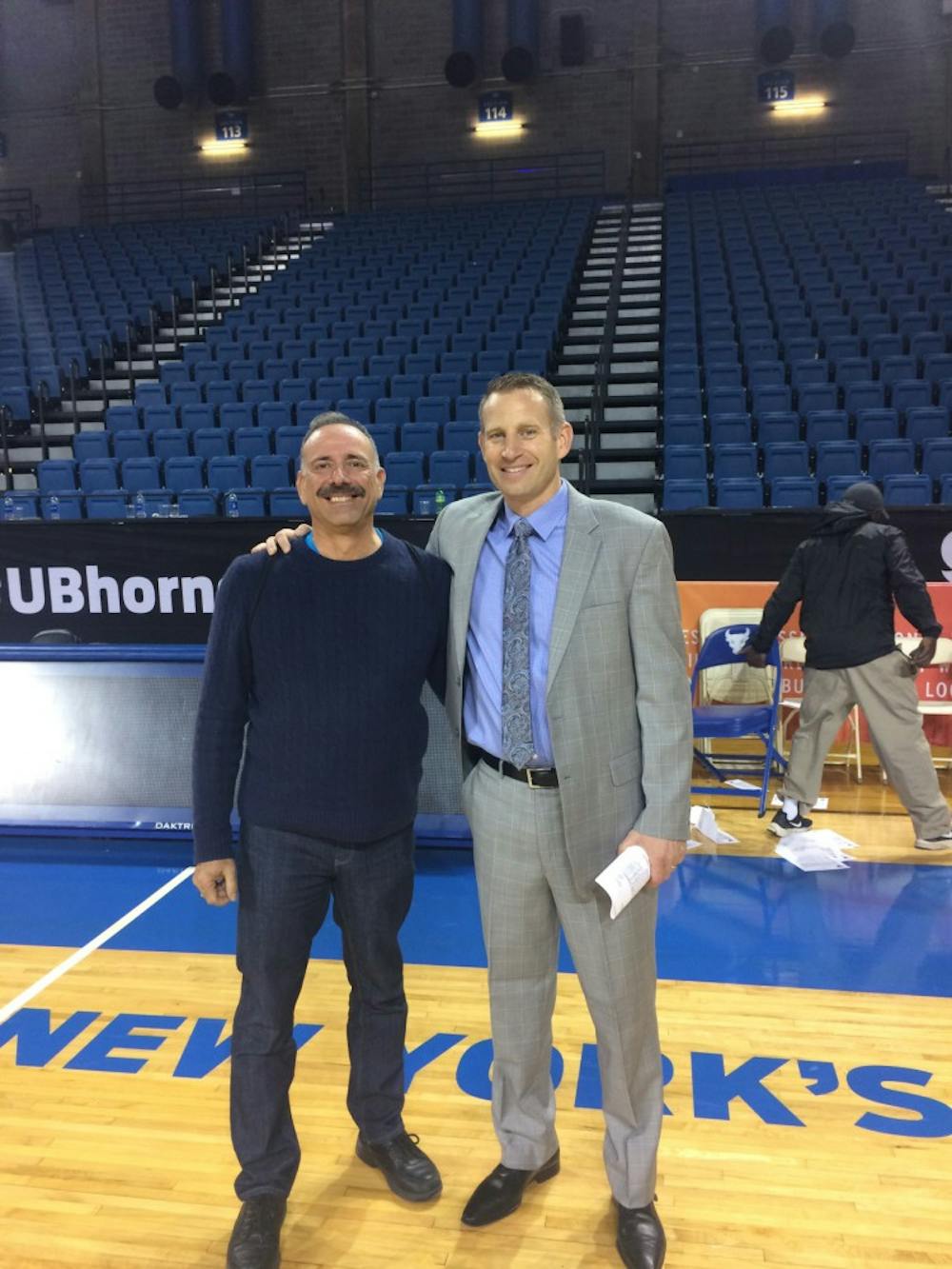 <p>Daniel Nardini (left) stands with men’s basketball head coach Nate Oats. The two spoke about his journey and UCONN basketball after a game against Saint Francis.</p>