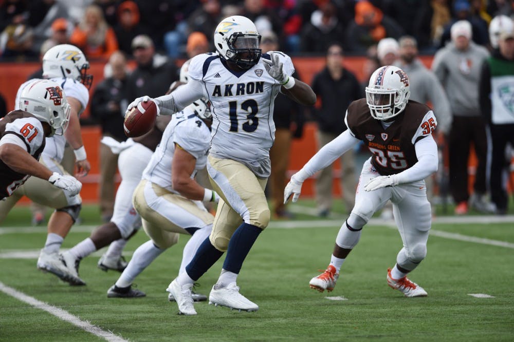 <p>Akron quarterback Thomas Woodson throws a pass with a Bowling Green blitz coming. Buffalo enters Akron on Saturday just one win away from Bowl eligibility.</p>