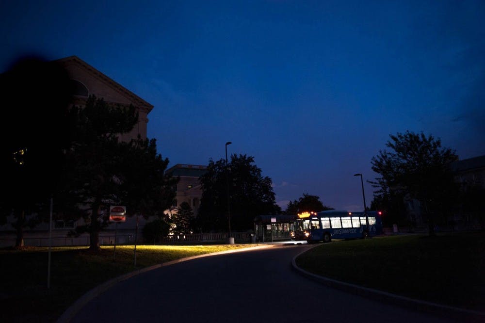 <p>A UB Stampede bus drops off students on a darkened South Campus Wednesday night. UB’s bus services from North to South Campus remained on schedule throughout Wednesday’s power outage.</p>