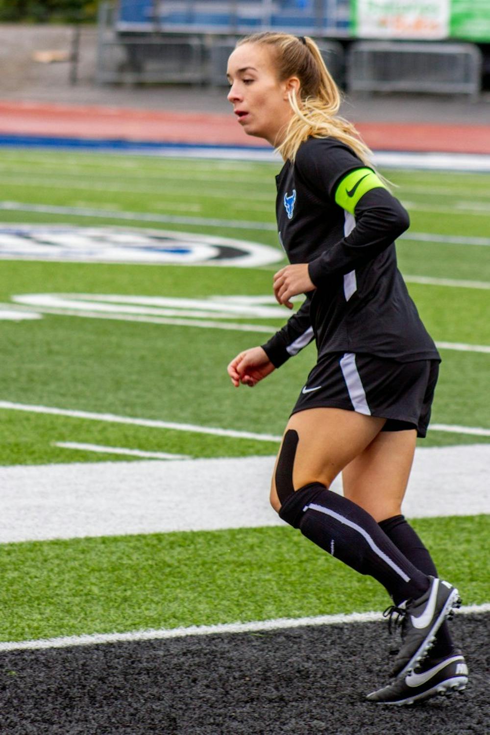 <p>Senior forward Carissima Cutrona runs on the pitch. Cutrona suffered a career-ending injury two weeks ago against Eastern Michigan and finishes her career as sixth-overall in points at UB.</p>