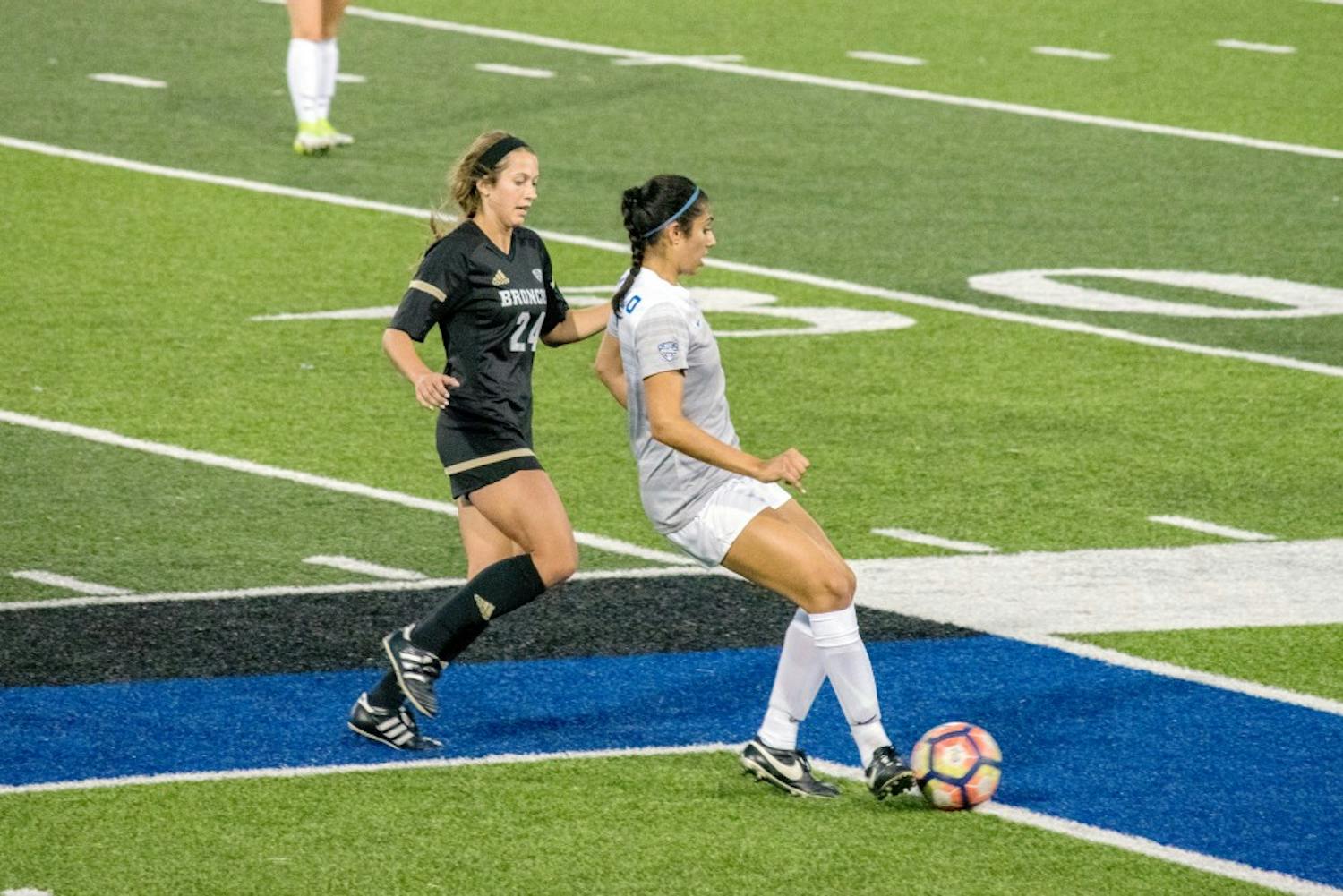 Sophomore defender Gurjenna Jandu tries to get ball control from the other team. The Bulls are looking to finish the season strong in their final five games.