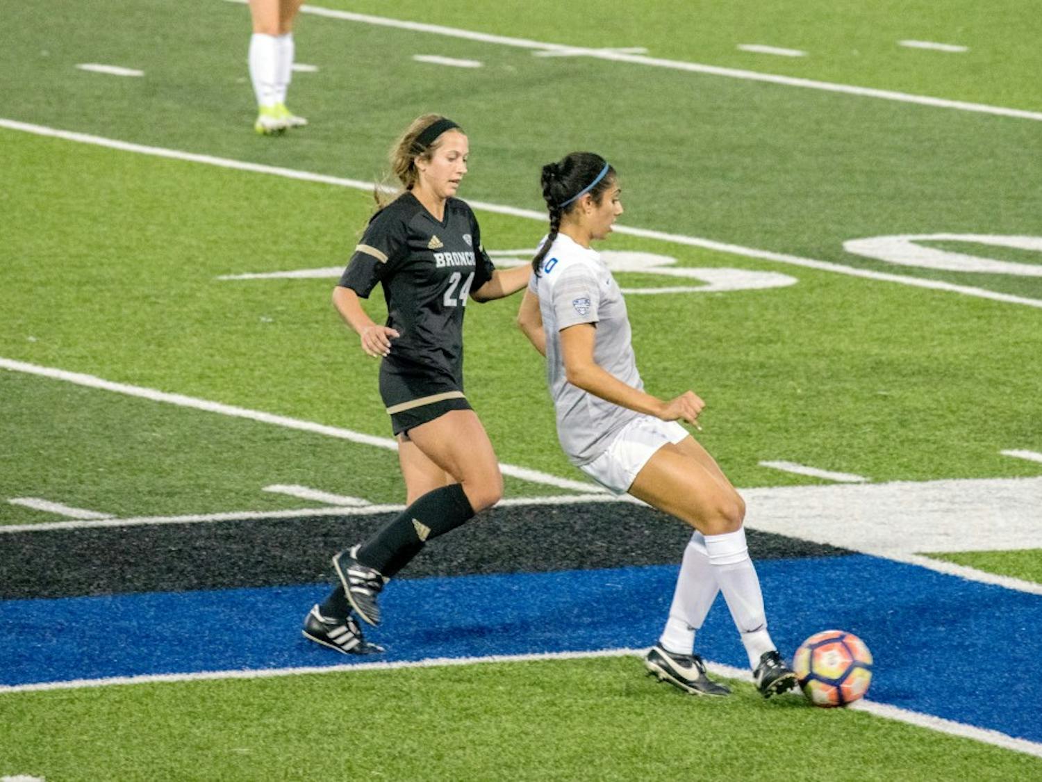 Sophomore defender Gurjenna Jandu tries to get ball control from the other team. The Bulls are looking to finish the season strong in their final five games.