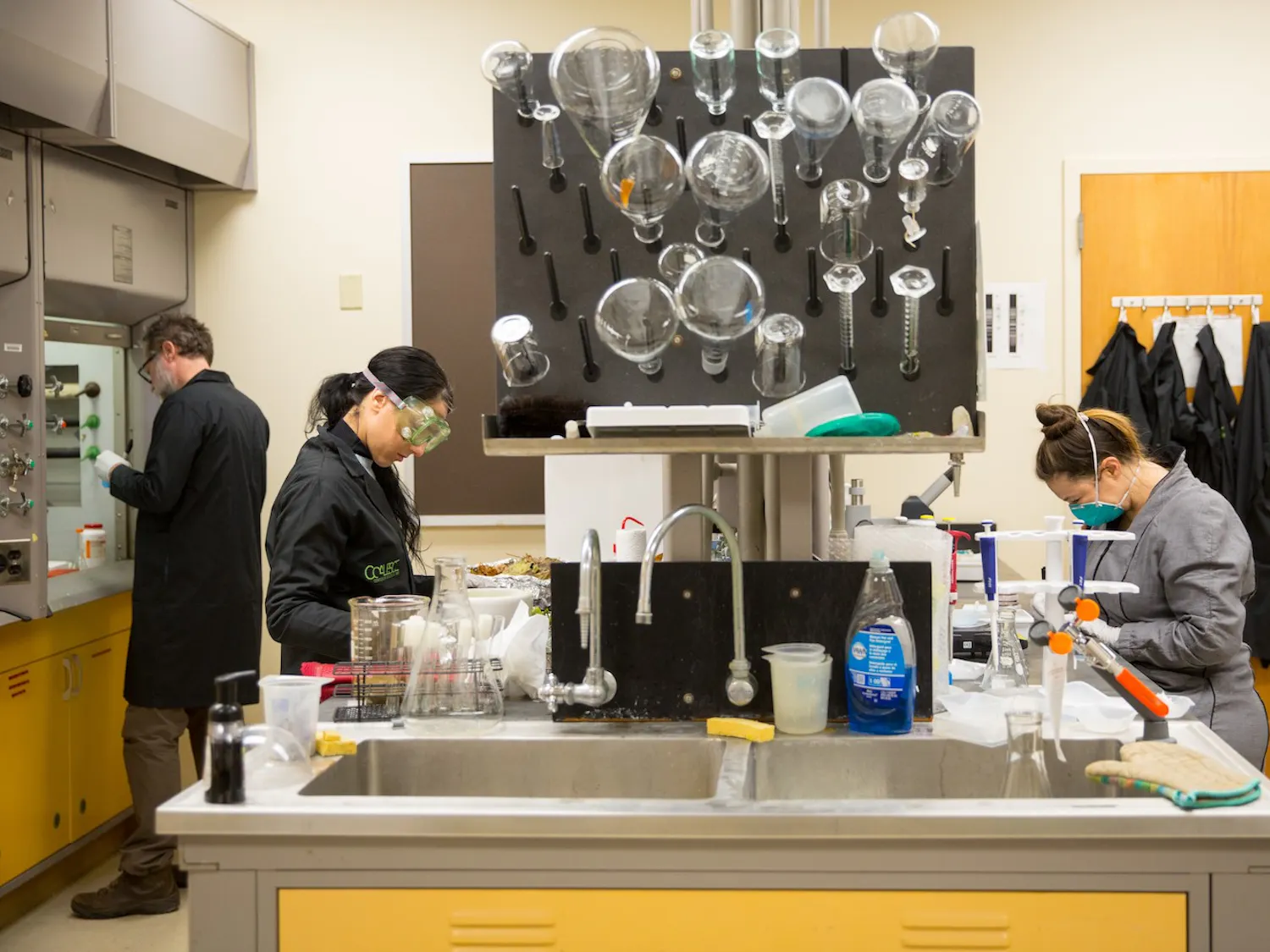 Lab manager Solon Morse (far left) with resident artists Sabrina Merayo Nuñez and Gunes-Hélène Isitan in 2018.