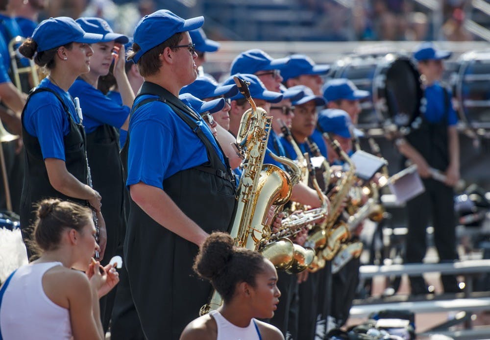 <p>The Thunder of the East wait to play in the stands. The marching band continues pageantry traditions while providing a unique experience to college football.</p>