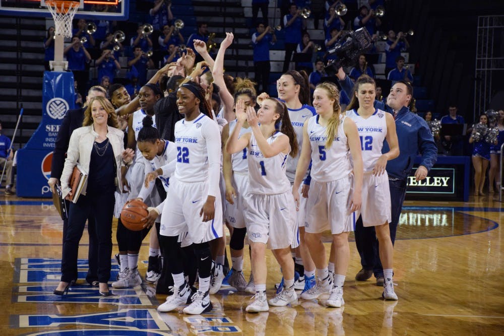 The women's basketball team celebrates its 60-44 victory over Bowling Green on March 7. Buffalo defeated No. 1 Ohio in the quarterfinals of the MAC Tournament on Wednesday.&nbsp;