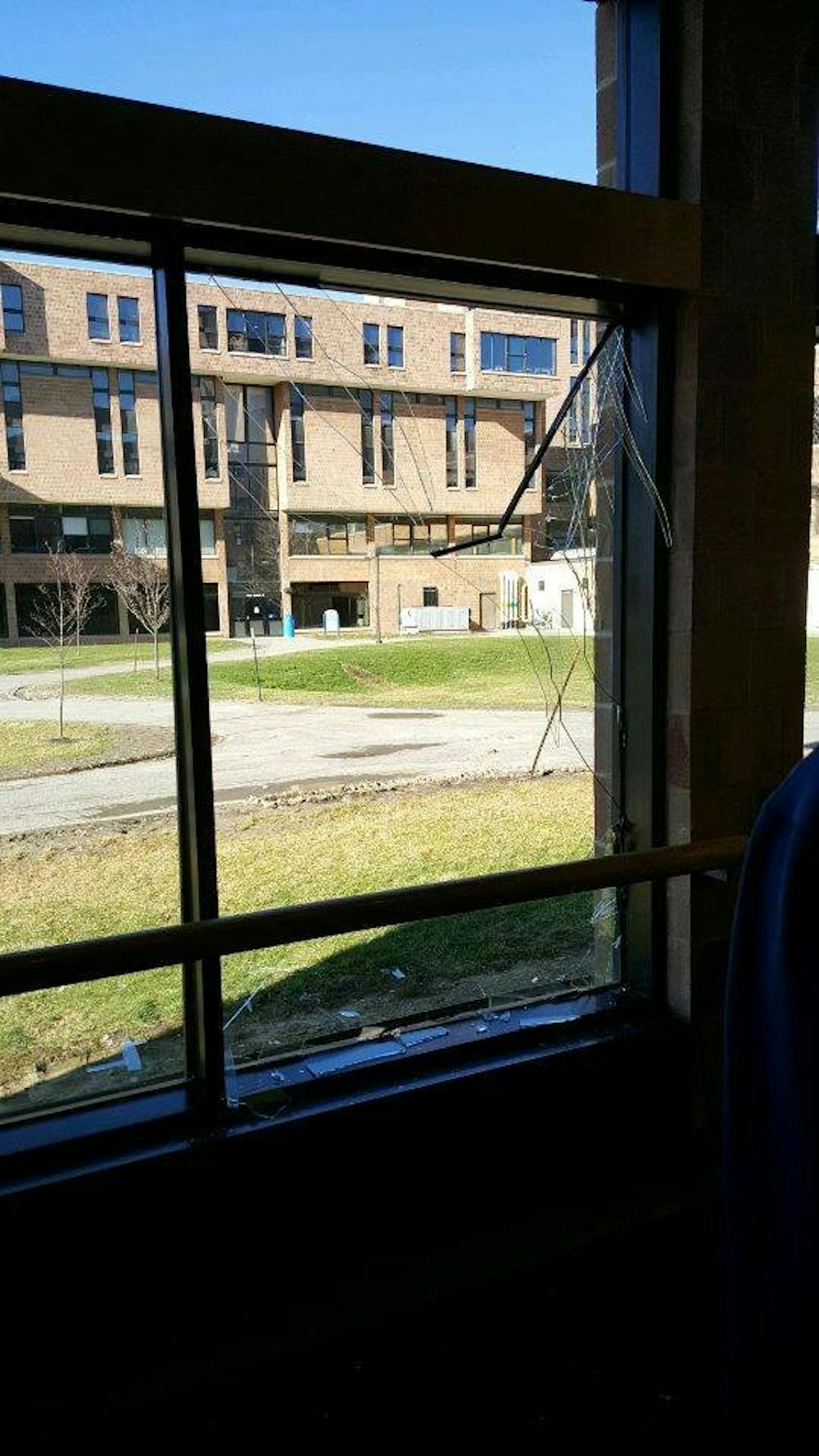 <p>A UB student went through the glass of this Porter Hall window Tuesday.&nbsp;</p>
