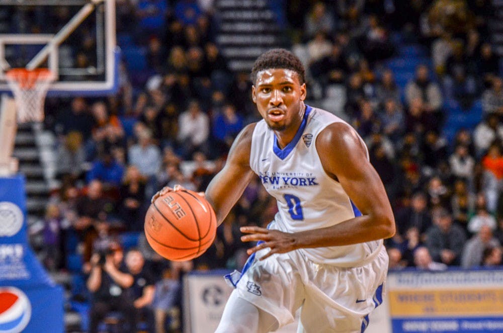 <p>Junior wing&nbsp;Blake Hamilton dribbles the ball up the court during Buffalo's 76-64 victory over Ball State on Tuesday night in Alumni Arena. Hamilton contributed 14 points and nine rebounds.&nbsp;</p>