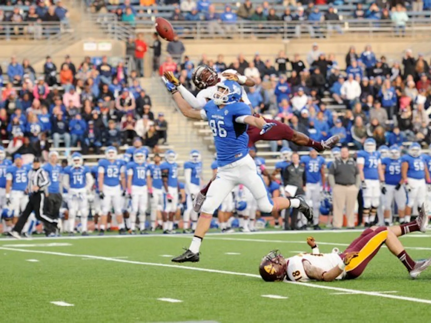 Junior wide receiver Ron Willoughby goes up for a pass during Saturday's 20-14 loss to Central Michigan. Willoughby caught four receptions for 90 yards and a touchdown. Yusong Shi, The Spectrum
