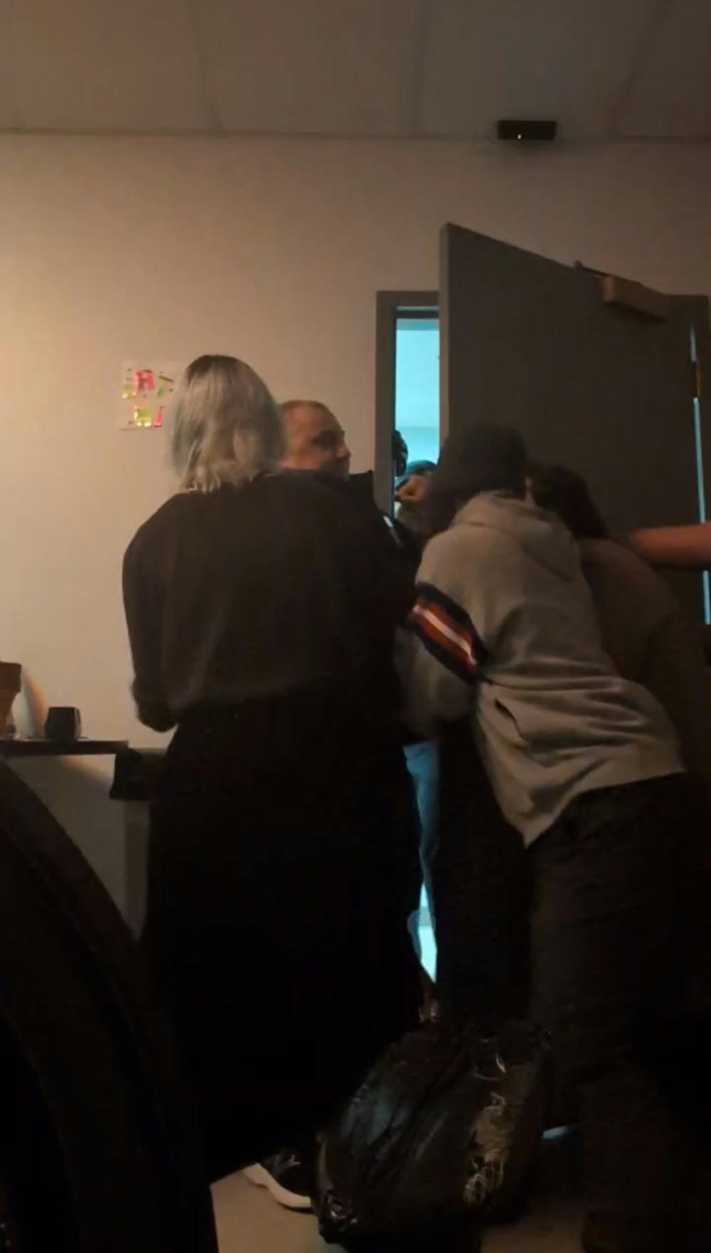 UPD Deputy Chief Scott Marciszewski and other officers force their way into SU 373 as UB's LGBTA club members push back against the door and Marciszewski in a video obtained by The Spectrum of Friday night’s sit-in, courtesy of Lorien Samarra.